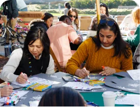 Women decorating STEM boxes