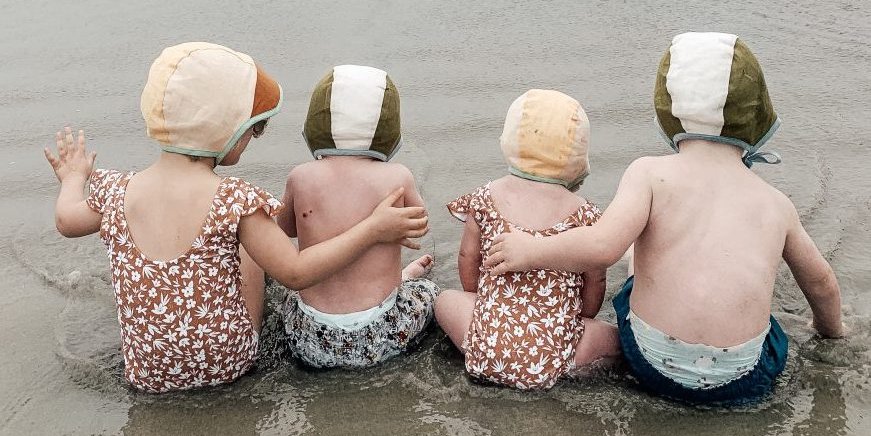 four toddlers at the beach shore foster to adopt advice
