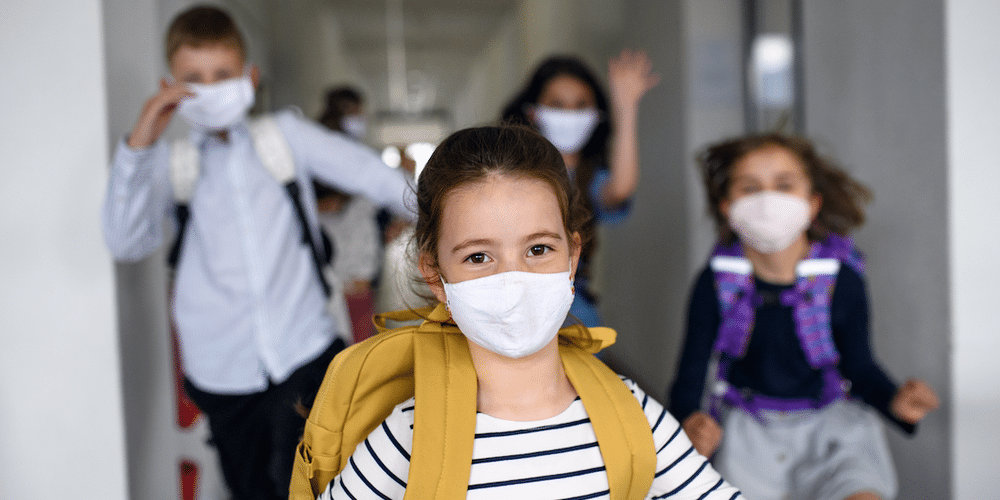 group of kids wearing facemask