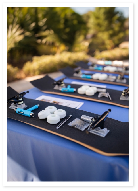 a row of skateboards ready to be built at a team building event