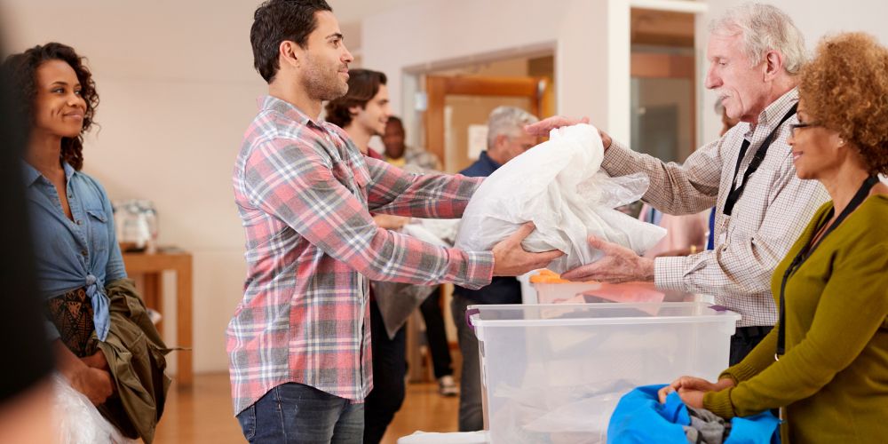 Man dropping off foster care agency donations