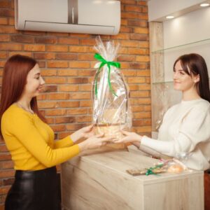 Woman buying a gift box set at a dstore