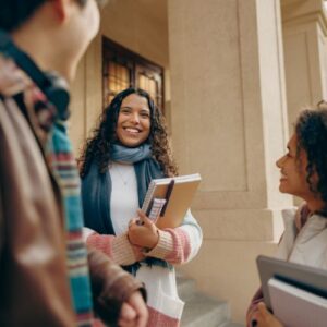 three students on college campus