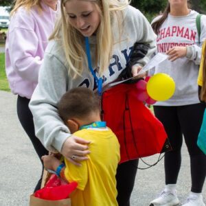 Woman with foster child at Birthday Palooza
