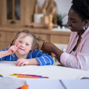woman doing foster child's hair